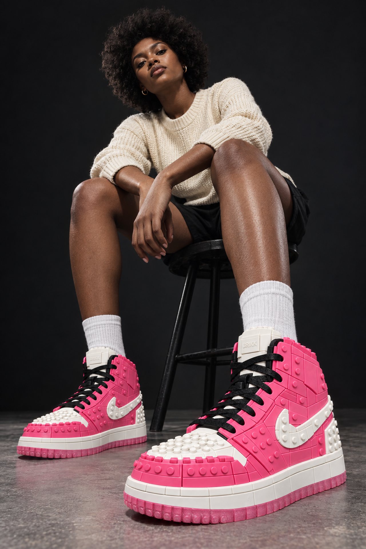 Model on a stool in the HI 01 Bubblegum